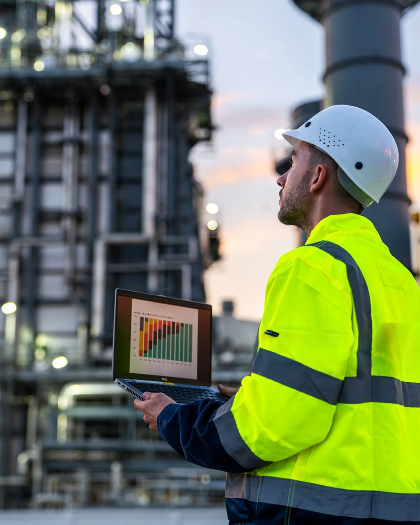 Construction professional reviewing site data